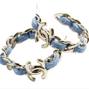 Brand new rare and collectible limited edition denim hoops larger earrings.Must!